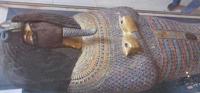 KV55 defaced coffin: Gilded and inlaid wooden coffin from KV55 in the Valley of the Kings, now in the Egyptian Museum of Antiquities in Cairo. The face and the cartouche containing