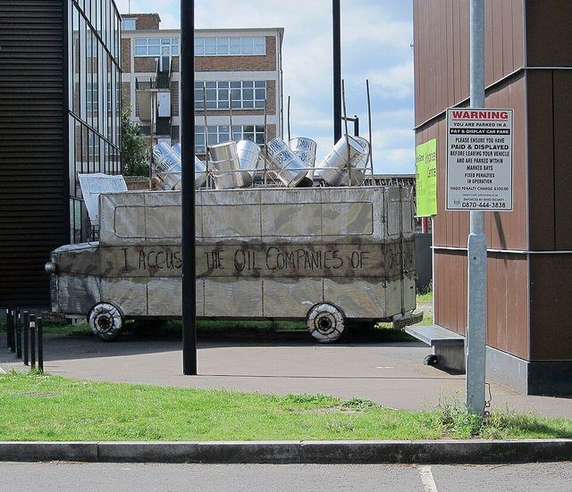 Bus Memorial to Ken Saro-Wiwa (5927206987): 9 July 2011. Ten feet high, steel sculpture of a Nigerian Bus parked behind the Bernie Grant Arts Centre, Tottenham. It's a memorial to