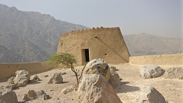 Dhayah Fort, Ras Al Khaimah: A conical shaped hill at the edge of the palm gardens and at the foot of the mountains, served as a natural defense post for the oasis. People have use