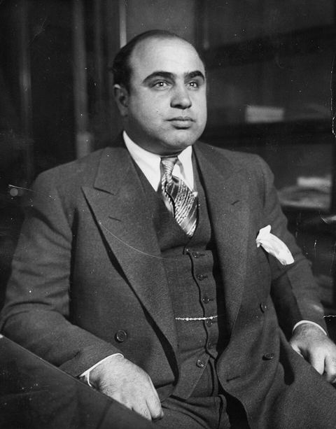 Al Capone: "Scarface" Al Capone is shown here at the Chicago Detective bureau following his arrest on a vagrancy charge as Public Enemy No. 1 in this 8 x 10 black & white origi