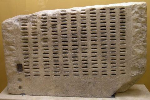 AGMA Kleroterion: Kleroterion. This device was used for the jury selection system in Athens. Bronze identification tickets were inserted to indicate eligible jurors who were also d
