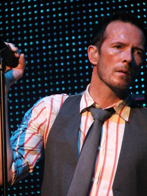 Scott Weiland: Scott Weiland onstage with a mic--2009-07