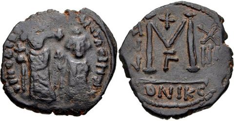 Byzantine-style coinage of Khosrow II, minted in Syria: Heraclius, with Heraclius Constantine. 610-641. Æ Follis (27mm, 9.91 g, 9h). Contemporary imitation of a Nicomedia mint issu