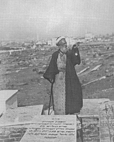 Cementry-Salonika: A rabbi makes a traditional visit to the cemetery. Salonica