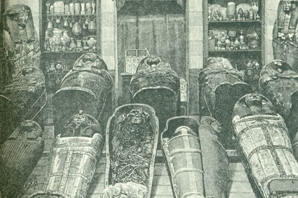 DB320 Mummies 1881: Photograph by Émile Brugsch of the Royal Cache of mummies found in DB320 by Gaston Maspero in 1881. Taken before the mummies were unwrapped.