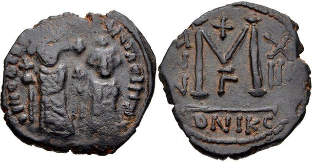 Byzantine-style coinage of Khosrow II, minted in Syria: Heraclius, with Heraclius Constantine. 610-641. Æ Follis (27mm, 9.91 g, 9h). Contemporary imitation of a Nicomedia mint issu