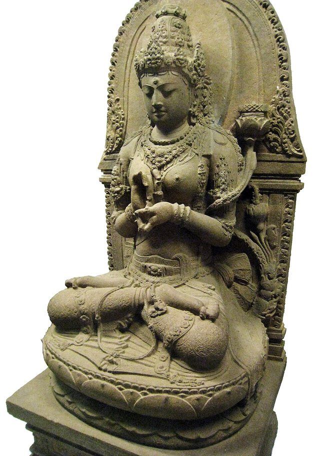 Prajnaparamita Java Side Detail: Bodhisattvadevi (female bodhisattva) Prajnaparamita; the buddhist goddess of transcendental wisdom, personified in a statue from 13th century Singh