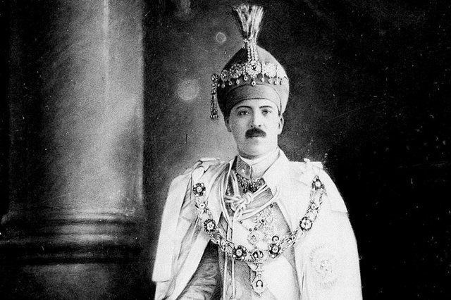 Usman Ali Khan: His Exalted Highness, the Nizam of Hyderabad, Osman Ali Khan, is pictured in an official photo wearing his coronation robes.